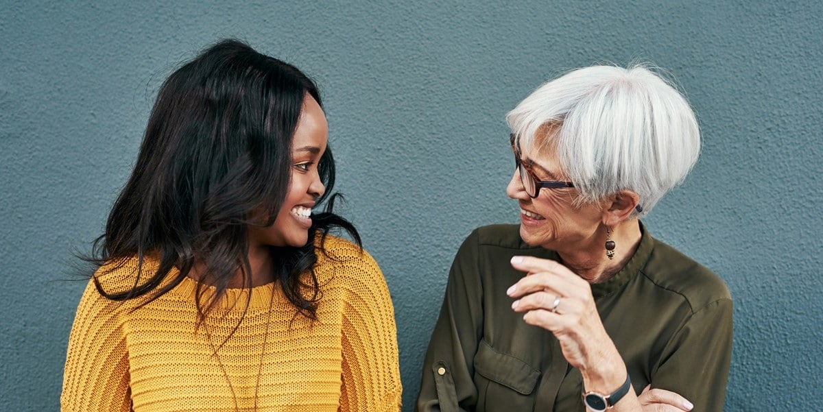 Two women looking at each other